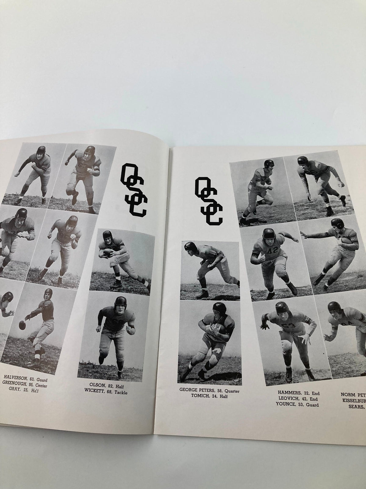 Pages from 'The Pigskin Review' showcasing player portraits from the USC Trojans football team, highlighting athlete positions and statistics.