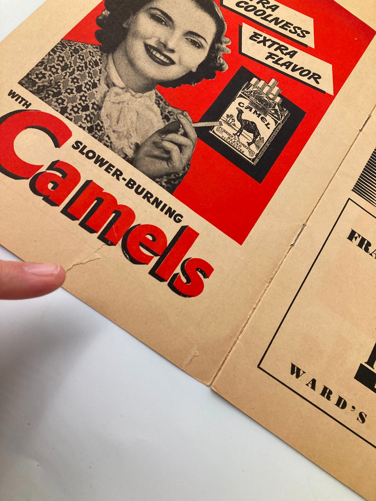 1940 The Yankees American League Baseball Club Official Score Card showcasing an advertisement with a woman holding a cigarette, featuring Camel brand cigarettes for added nostalgia.