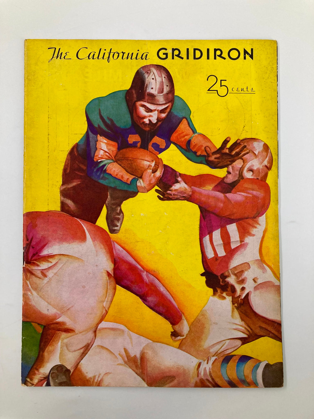 Cover of the 1935 NCAA Football California Gridiron vs St. Mary’s Official Program featuring a player in action against two opponents.