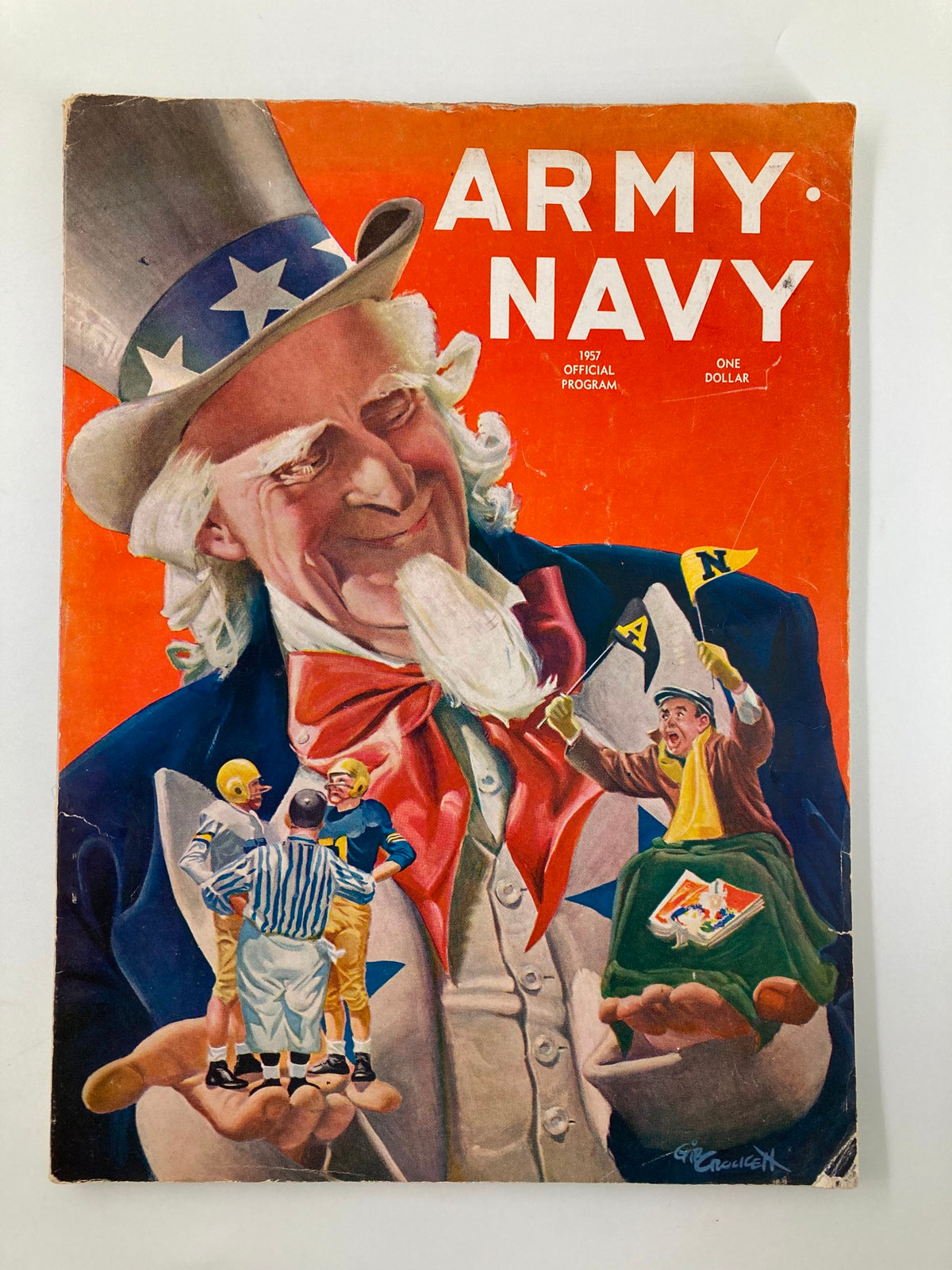 Cover of the 1940 NCAA Football Army vs Navy Official Program featuring a colorful illustration of Uncle Sam, capturing the spirit of the iconic rivalry.