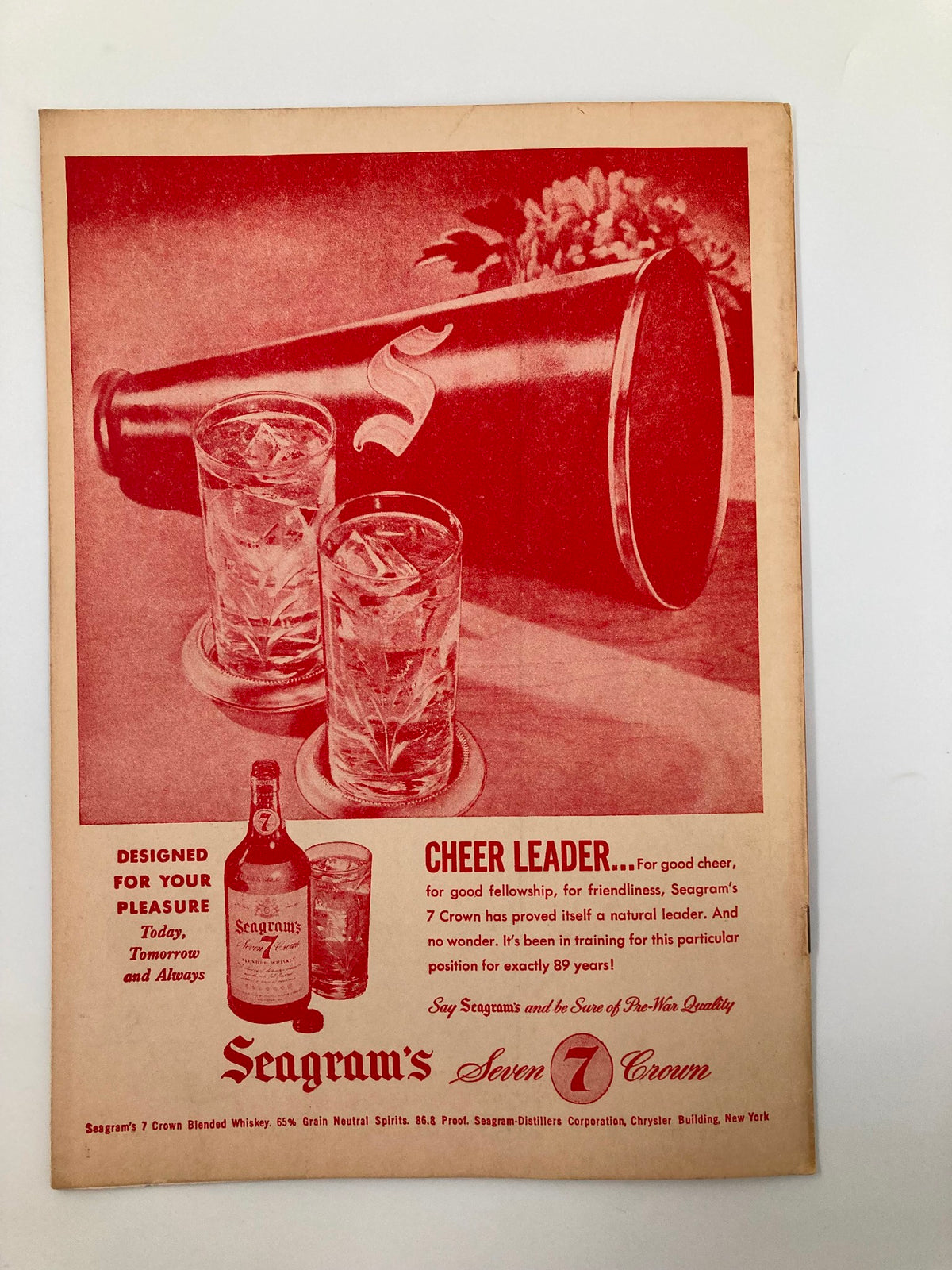 1946 NCAA Basketball St. Joseph's Hawks vs Nevada Wolf Pack Official Program cover page with a vibrant red advertisement for Seagram's Seven Crown whiskey.