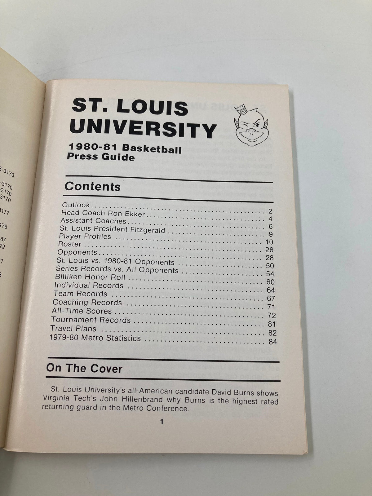 1980-1981 NCAA Saint Louis University Billikens Basketball Press Guide containing contents such as outlook, team records, and player profiles. Features a photo of the press guide's interior highlighting the table of contents.