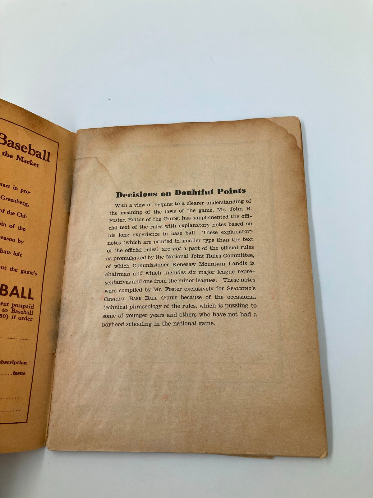 Interior page displaying explanations from the 1939 Official Base Ball Rules for National and American Leagues, providing insights on doubtful points in baseball regulations.