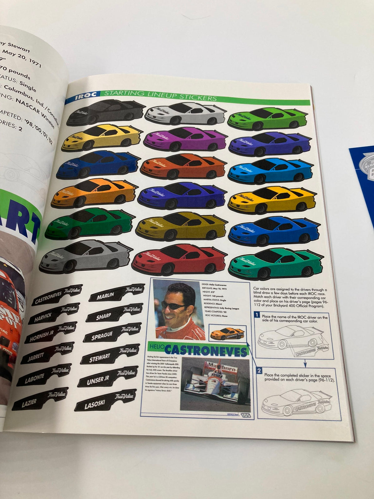 Illustration from the August 4 2002 NASCAR Brickyard 400 Starting Field Official Program featuring colorful car designs and a profile of Helio Castroneves.