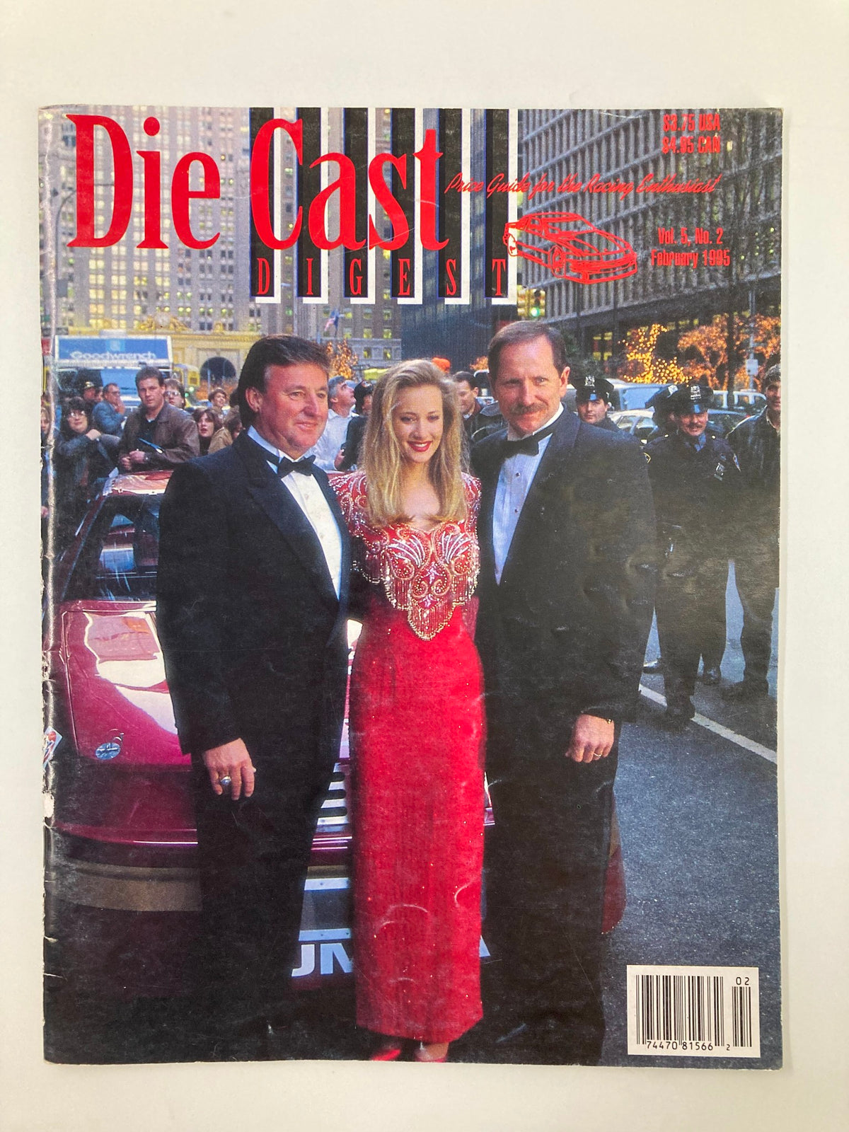 Cover of Die Cast Digest Magazine February 5 1995 Vol 5 #2 featuring a red dress model and two men in tuxedos at a public event.