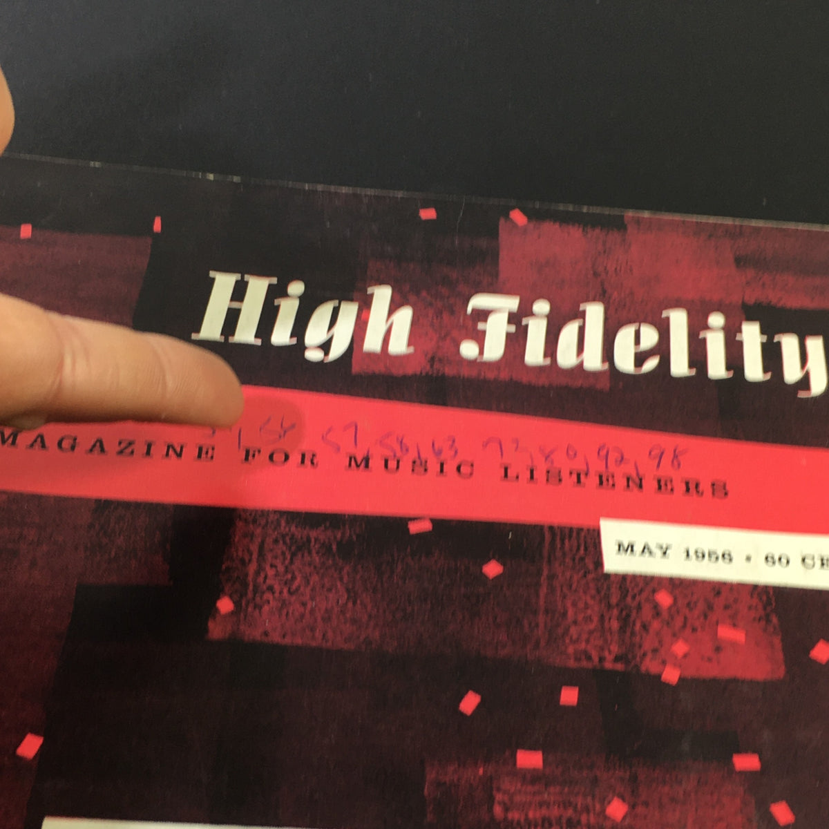 Close-up view of the title and details on the front cover of the VTG High Fidelity Music Magazine May 1956, featuring text highlighting its focus on music listeners.