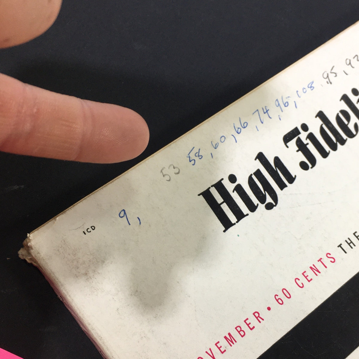 Detail view of the top edge of the VTG High Fidelity Music Magazine from November 1958, showing handwritten notes and the magazine title, highlighting its vintage appeal.
