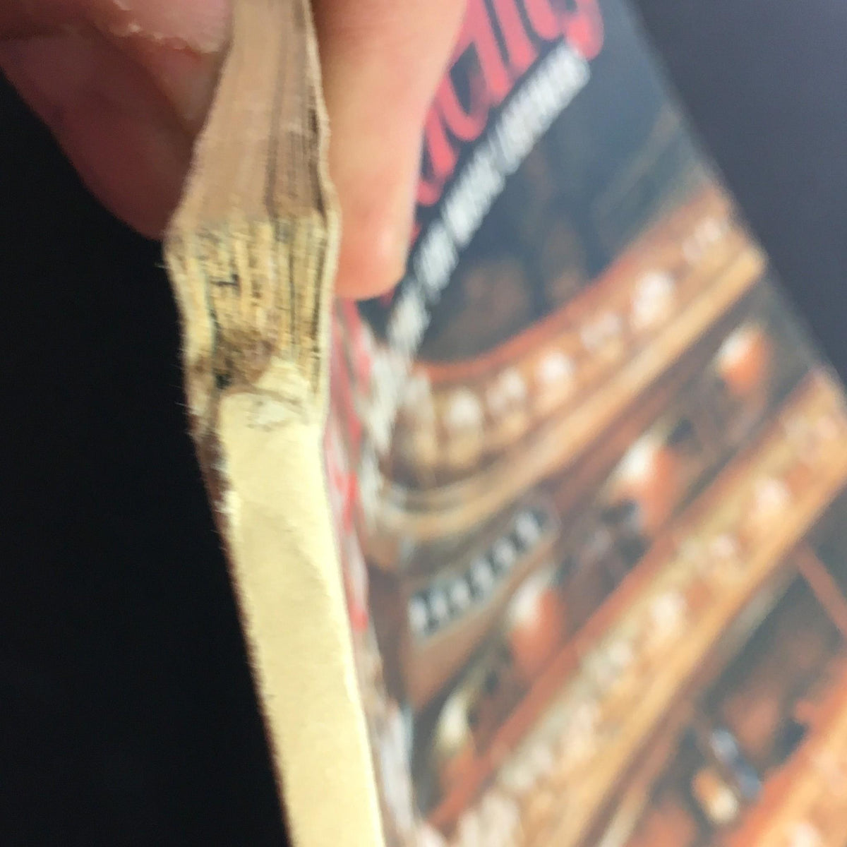 Close-up of the spine of VTG High Fidelity Music Magazine November 1961, revealing wear and tear, showcasing its historical significance for collectors.