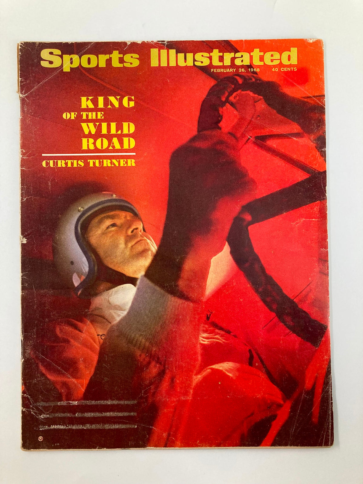 Cover of Sports Illustrated Magazine dated February 26, 1968, featuring Curtis Turner, known as the King of Wild Road, depicted in a racing environment.