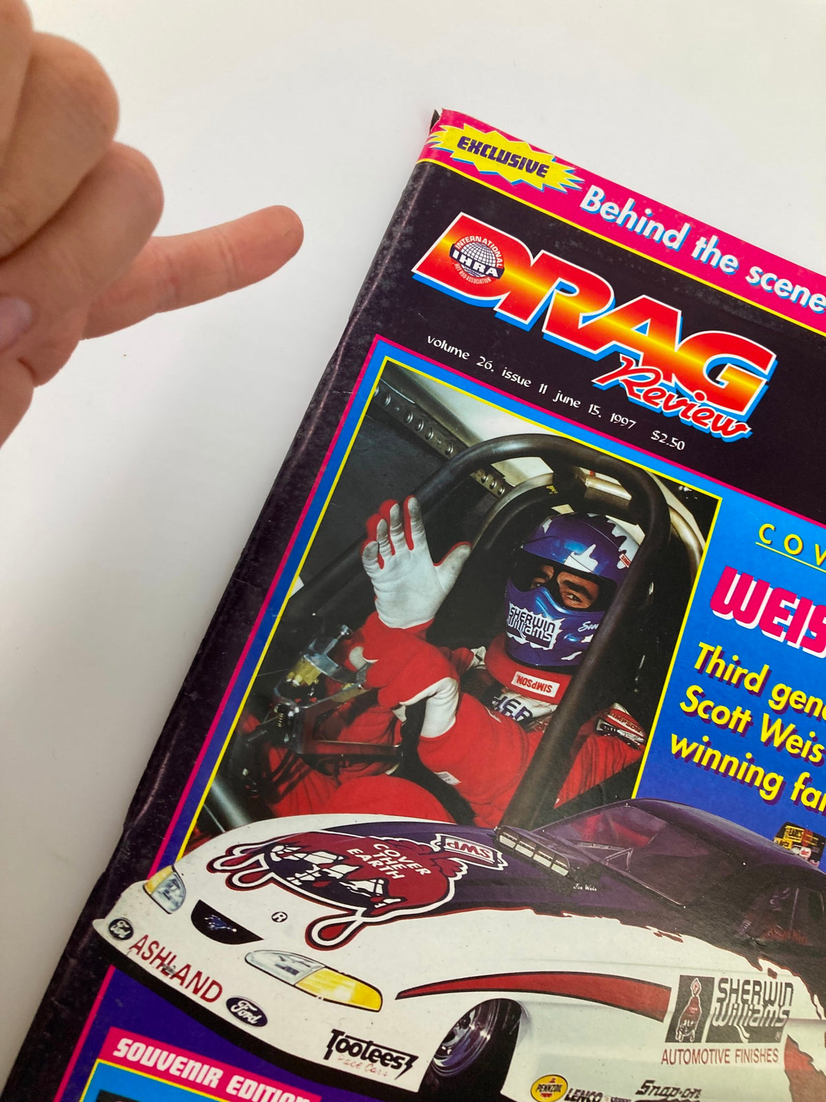 Close-up of the IHRA Drag Review Magazine cover dated June 15, 1997, highlighting third generation racer Scott Weis giving a thumbs-up from inside his race car, emphasizing the excitement of drag racing.