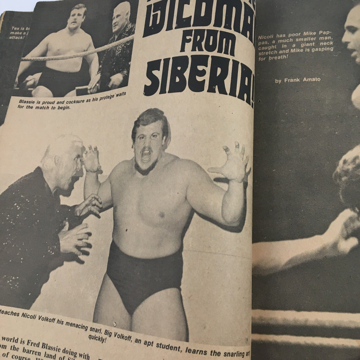 Wrestling Guide October 1974 Ivan Putski, Bearcat Wright & Tex McKenzie featuring a dramatic scene with wrestler Big Volkoff and his mentor, Blassie.