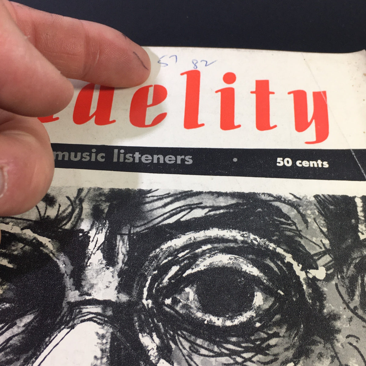Close-up view of the cover of VTG High Fidelity Music Magazine November 1954, showing details of the title and artwork related to Igor Stravinsky, focusing on the magazine's significance in music history.