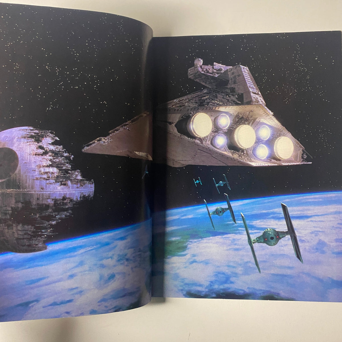 Interior page of the 1983 Star Wars Return Of The Jedi, Official Collectors Edition showcasing a starship battle including TIE fighters and the Death Star.