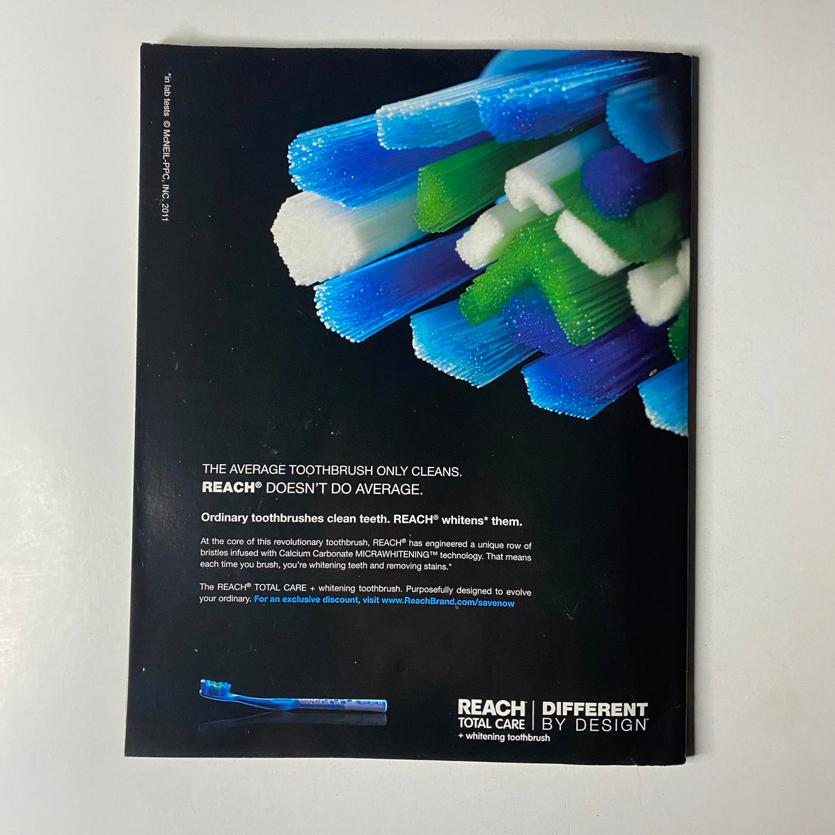 Back cover of Ebony Magazine April 2011, Vol. LXVI, No. 6, featuring a Reach dental care advertisement.