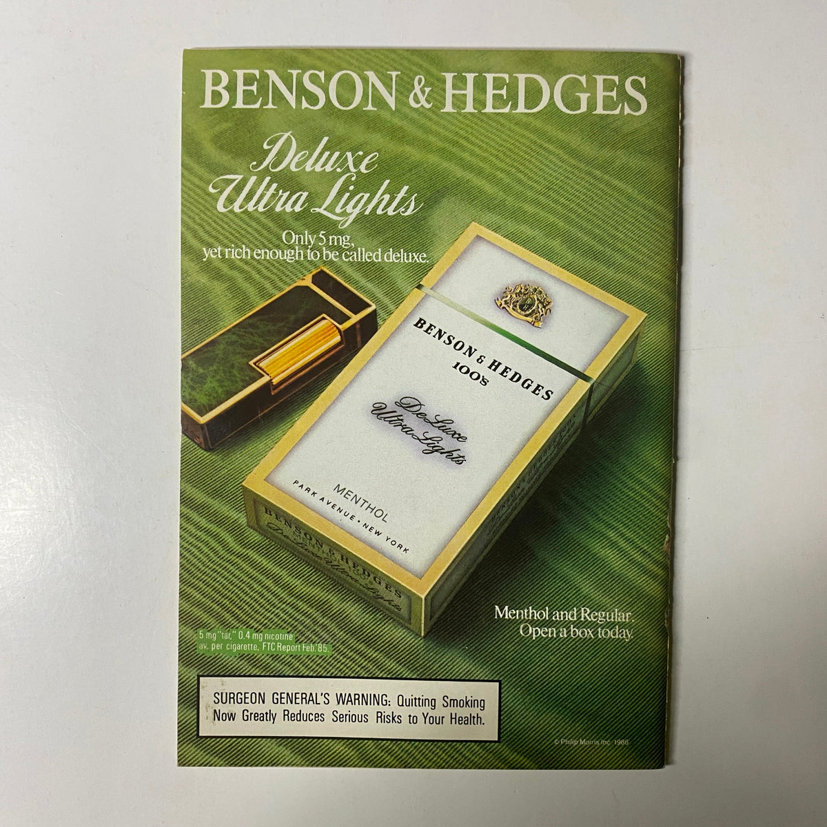 Vintage advertisement for Benson & Hedges cigarettes in Jet Magazine, December 22, 1986, featuring a stylish pack design emphasizing 'Deluxe Ultra Lights,' Volume 71, No. 14.