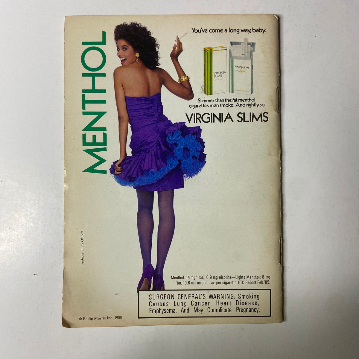 Vintage Virginia Slims advertisement featuring a woman in a stylish purple dress on the back cover of Jet Magazine, July 18, 1988, Vol. 74, No. 16.