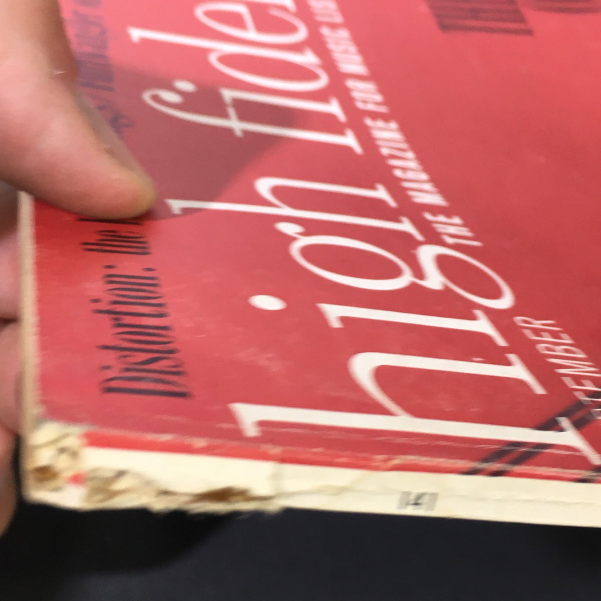 Side view showing the edge of the VTG High Fidelity Music Magazine September 1964, with visible wear and the title featuring 'Distortion: the Latest Findings'.