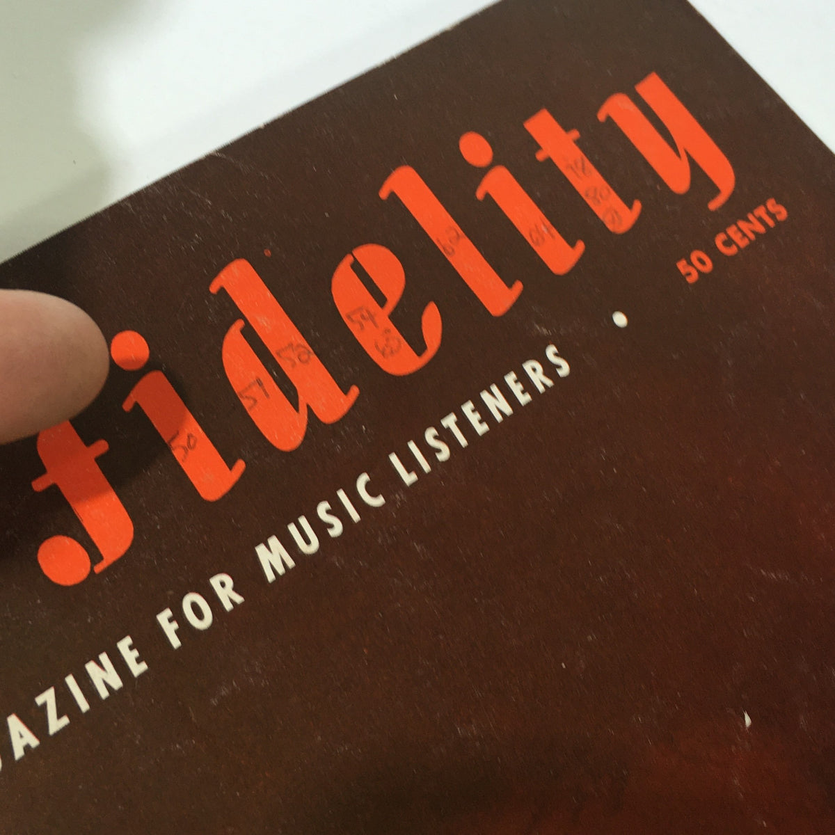 Close-up view of the High Fidelity Music Magazine title from March 1954, highlighting its vintage design and the tagline 'The Magazine for Music Listeners'.
