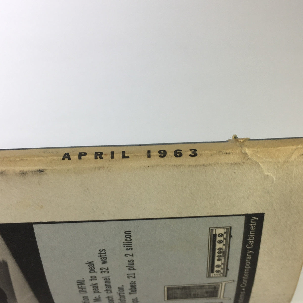 Close-up image of the spine of the VTG High Fidelity Music Magazine April 1963, highlighting the publication date and signs of vintage wear.