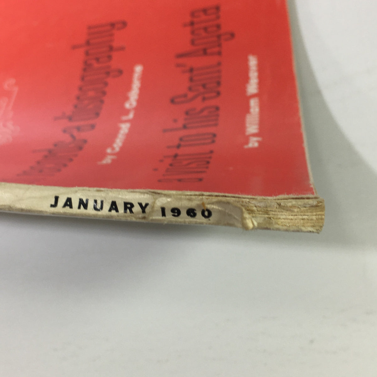 Detailed image of the spine of the vintage High Fidelity Music Magazine from January 1960, clearly displaying the publication date and showcasing the magazine's aging and collectible qualities.
