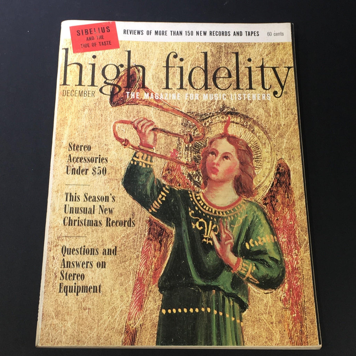 Cover of VTG High Fidelity Music Magazine December 1965 featuring an angel playing a trumpet, highlighting Sibelius and the tide of taste in music with articles and reviews.