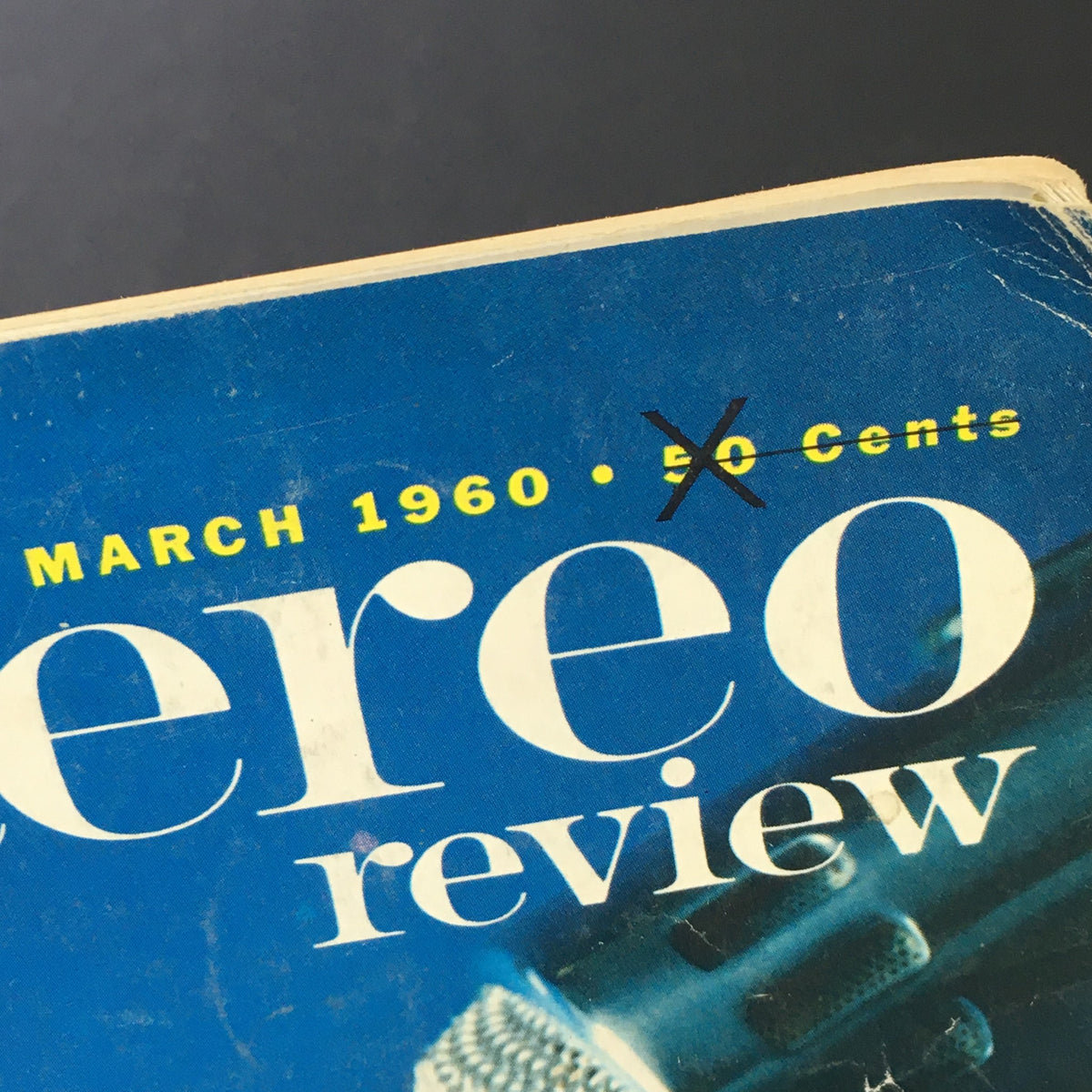 Close-up of the March 1960 HiFi Stereo Review Magazine cover, highlighting the date and price with '50 cents' marked through, showcasing vintage audio nostalgia.