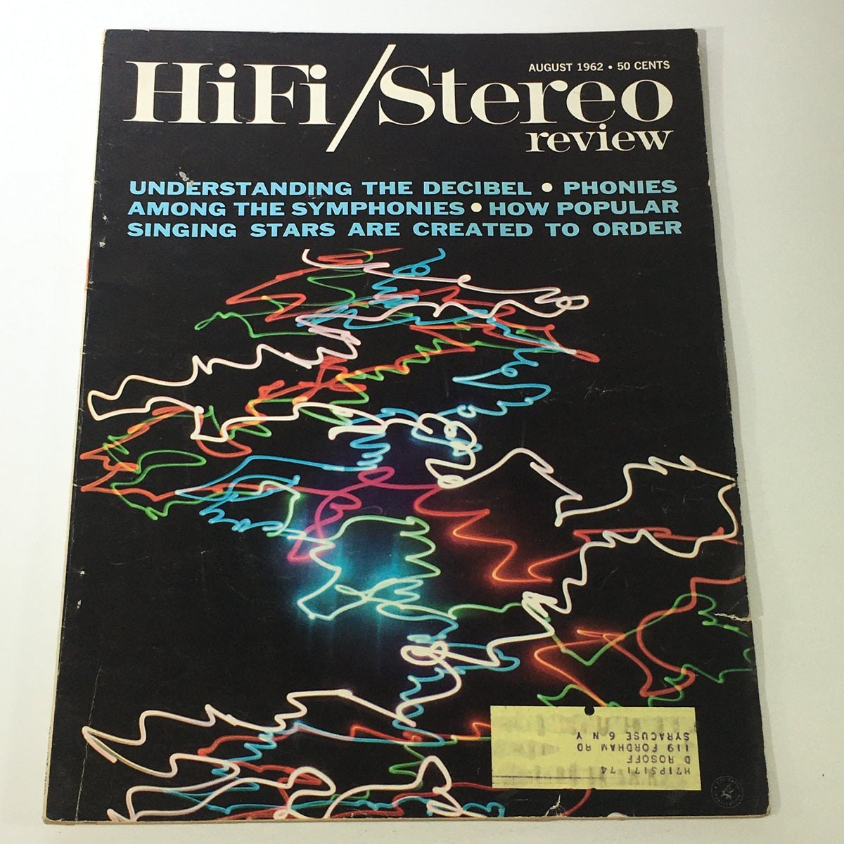 Cover of VTG HiFi Stereo Review Magazine August 1962 featuring the title 'Understanding The Decibel' along with colorful abstract wave designs, showcasing its vintage audio technology theme.