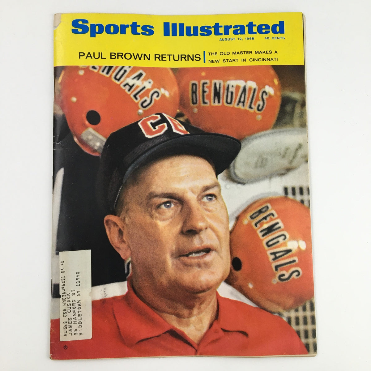 Cover of Sports Illustrated Magazine dated August 12, 1968, featuring football coach Paul Brown, highlighting his return with Cincinnati Bengals helmets in the background.