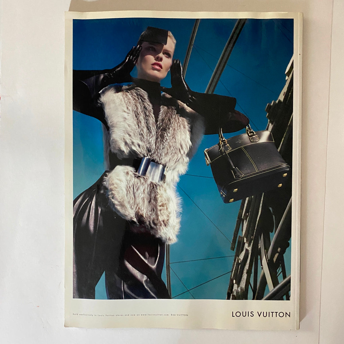 V Magazine July/August 2008 No. 54 cover featuring supermodel Gisele Bundchen styled in Louis Vuitton, showcasing a high-fashion look with a fur accent and modern accessories, captured by Mario Testino.