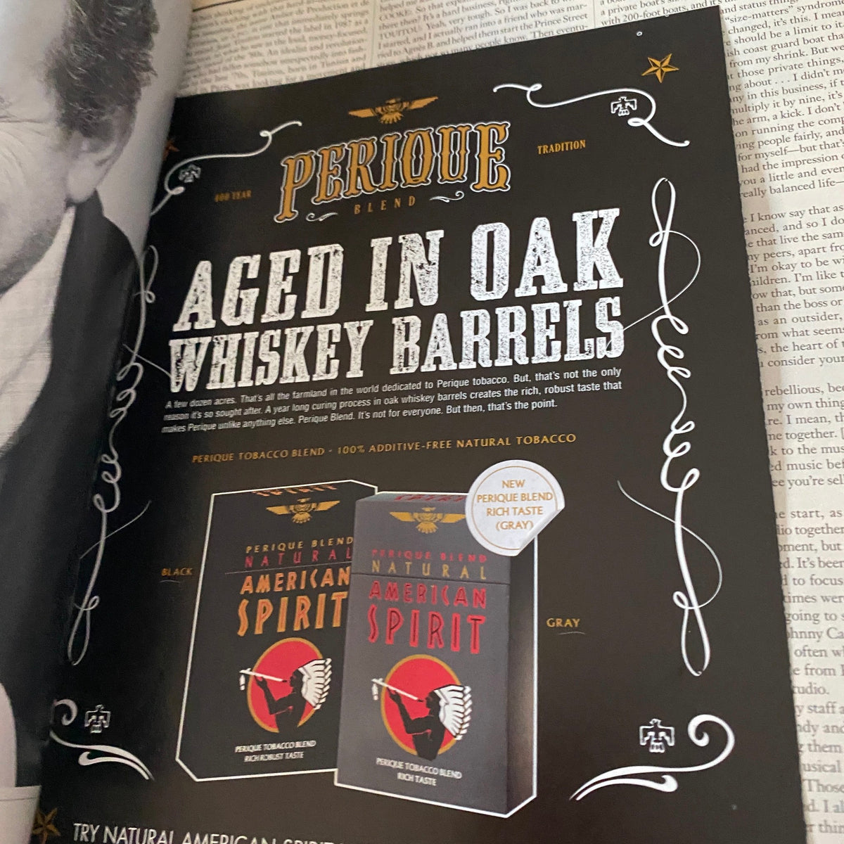 Page from Interview Magazine August 2010 that features a vintage advertisement for Perique Blend American Spirit tobacco products.