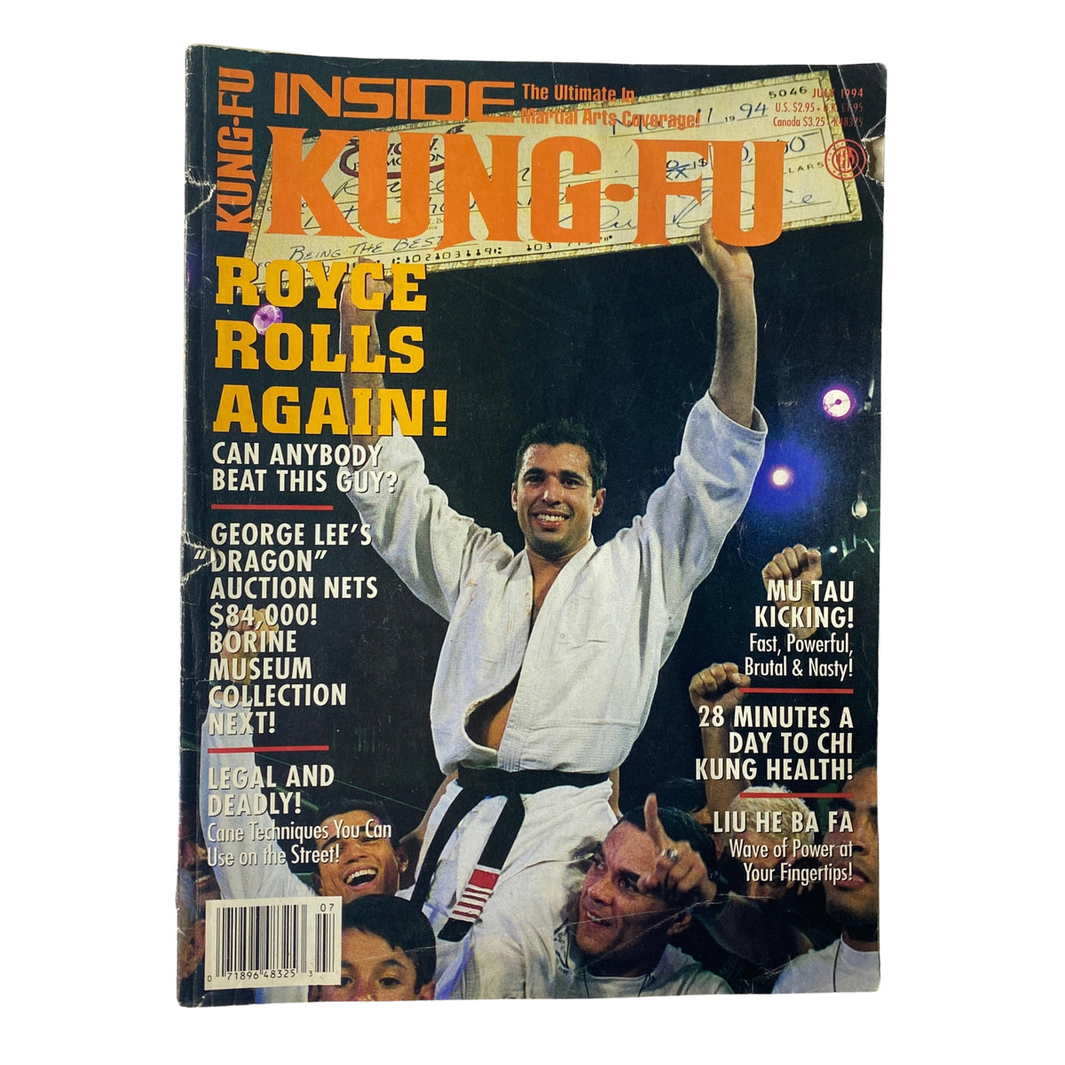 Inside Kung Fu Magazine July 1994 featuring Royce Gracie on the cover, emphasizing his influence in martial arts with headlines about Mu Tau kickfighting and internal power training.