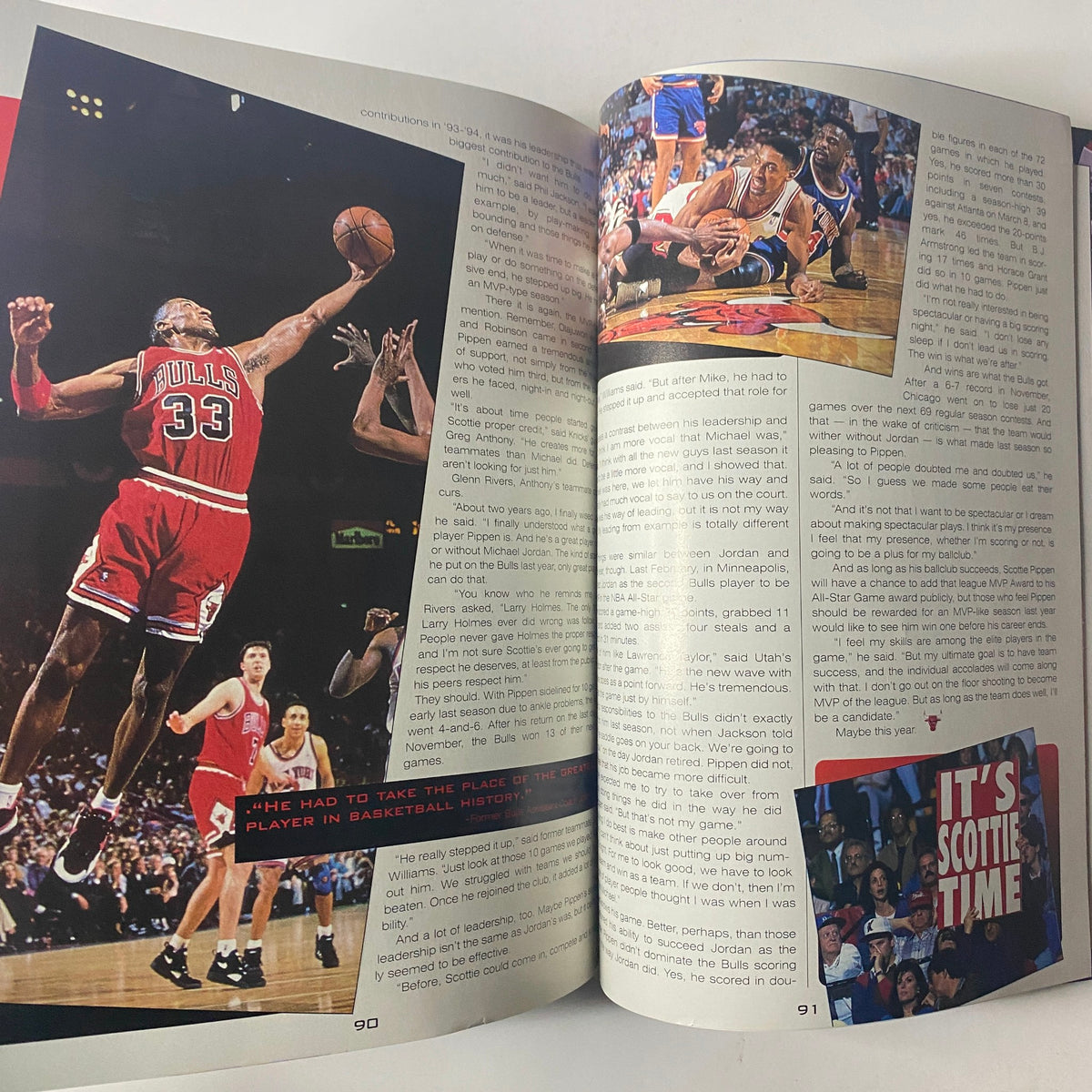 1994 - 1995 Chicago Bulls Official Yearbook highlighting Michael Jordan's iconic slam dunk and game statistics, featured in a collectible sports memorabilia edition.