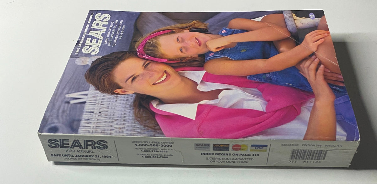 1993 Sears Spring Summer Annual Catalog cover featuring a smiling model with a child, showcasing vintage fashion styles.