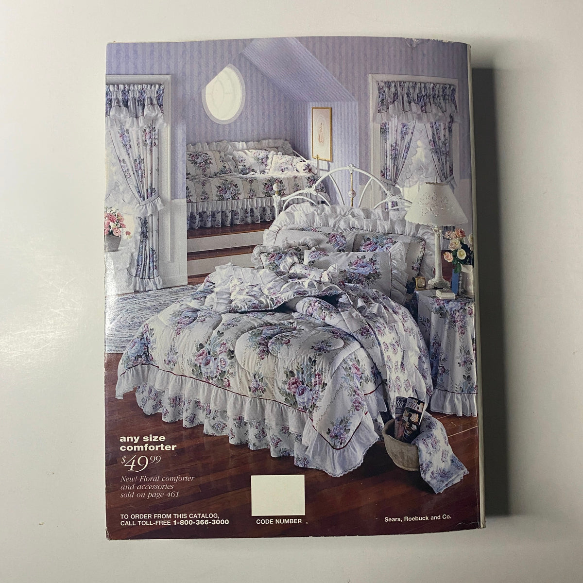 Image from the 1993 Sears Spring Summer Annual Catalog featuring a floral comforter set, highlighting pricing and available sizes for bedroom decor.