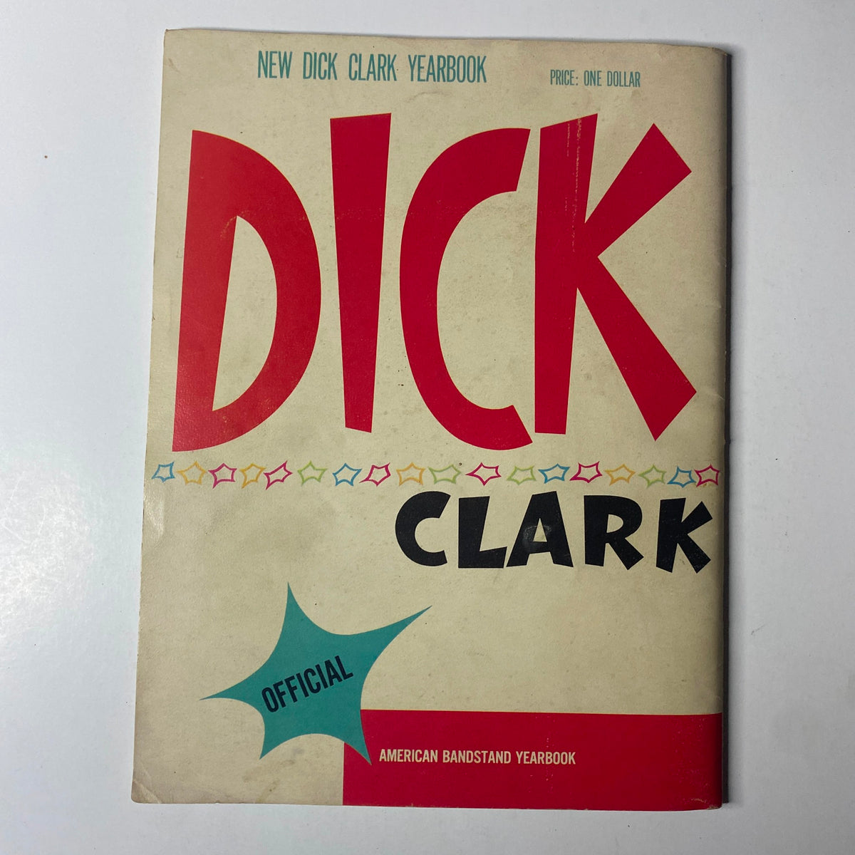 Cover of the 1959 Dick Clark Official American Bandstand Picture Yearbook featuring bold typography and colorful graphics, symbolizing the vibrant youth culture of the 1950s.