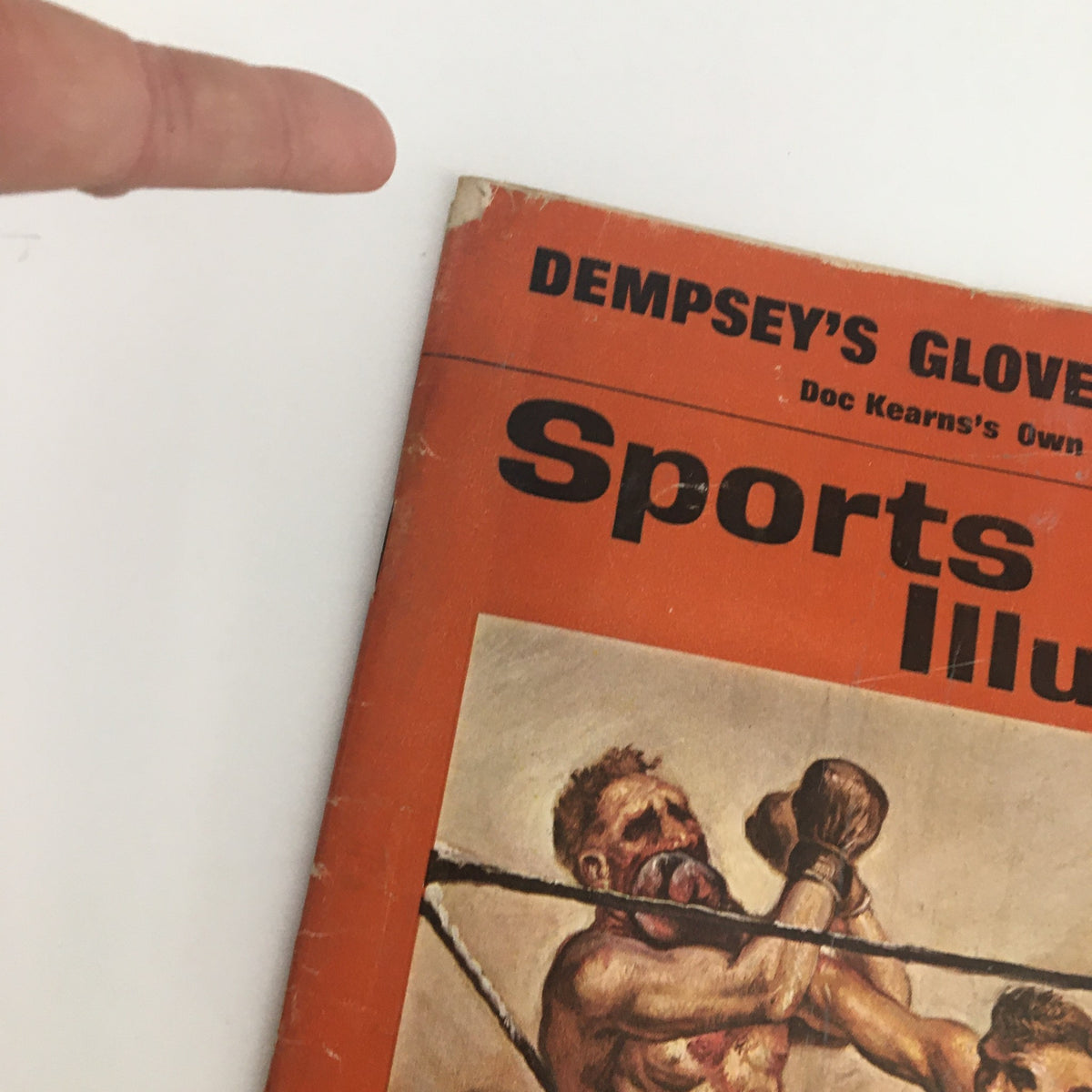 Close-up of Sports Illustrated Magazine January 13 1964 cover, highlighting the title and boxing theme associated with Jack Dempsey.