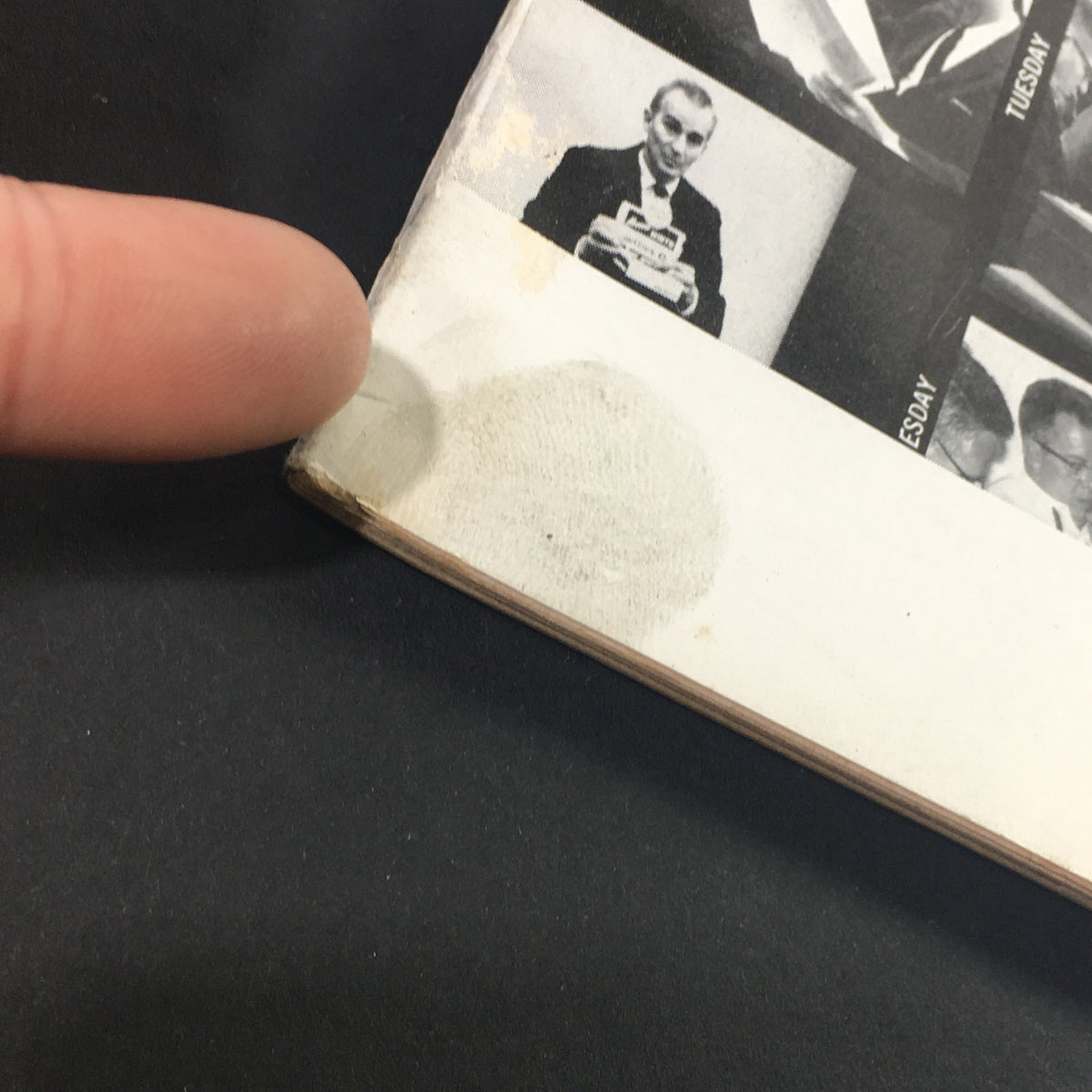Side view of VTG Business Management Magazine June 1964, highlighting minor wear and tear typical of vintage collectibles, with a finger pointing to a mark on the cover.