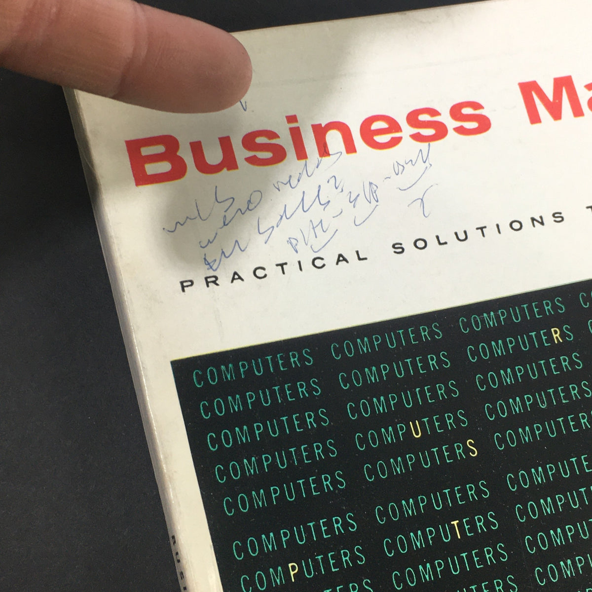 Close-up of the VTG Business Management Magazine October 1964 cover, showcasing its title and detailed patterns of the word 'COMPUTERS'. The vintage magazine reflects the 1960s business landscape.
