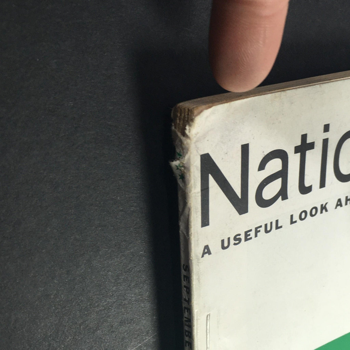 Side view of VTG Nation's Business Magazine September 1964, highlighting its age and slight damage on the binding.