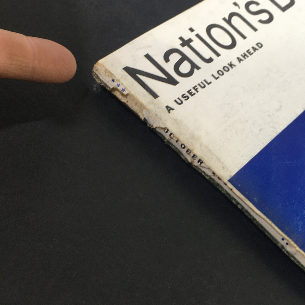 Spine view of VTG Nation's Business Magazine October 1964, illustrating wear and a vintage design, highlighting its collectible status.