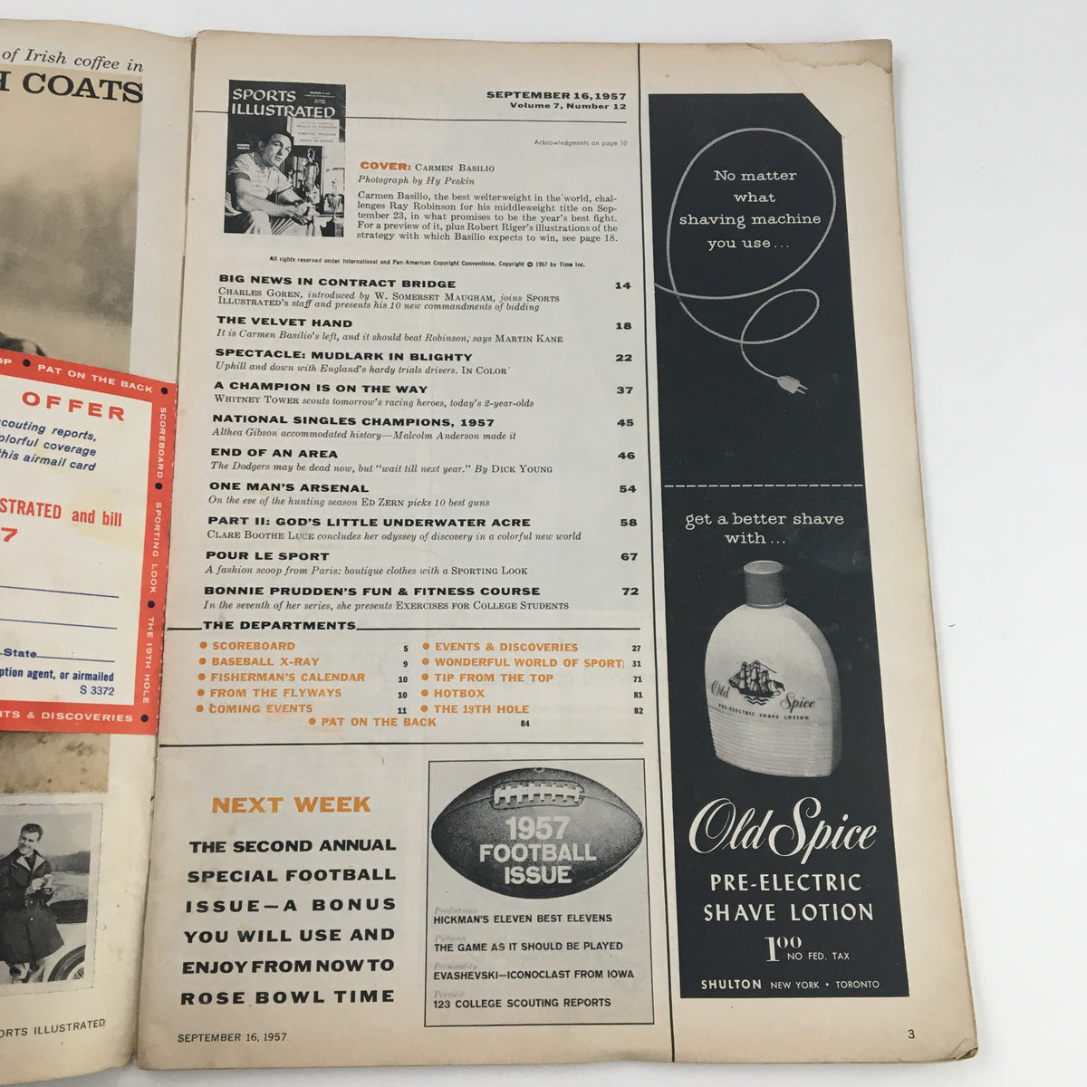 Interior page of Sports Illustrated Magazine September 16, 1957, featuring boxer Carmen Basilio on the cover, along with various articles, advertisements, and a preview of the upcoming 1957 Football Issue.