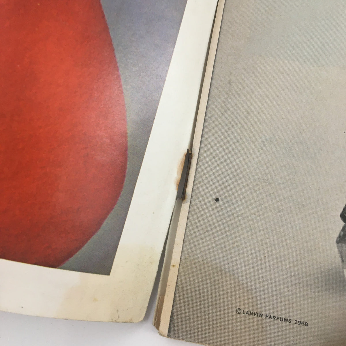Close-up of the interior pages of the December 9, 1968 Sports Illustrated magazine, displaying vintage advertisement and wear marks, highlighting the magazine's age.