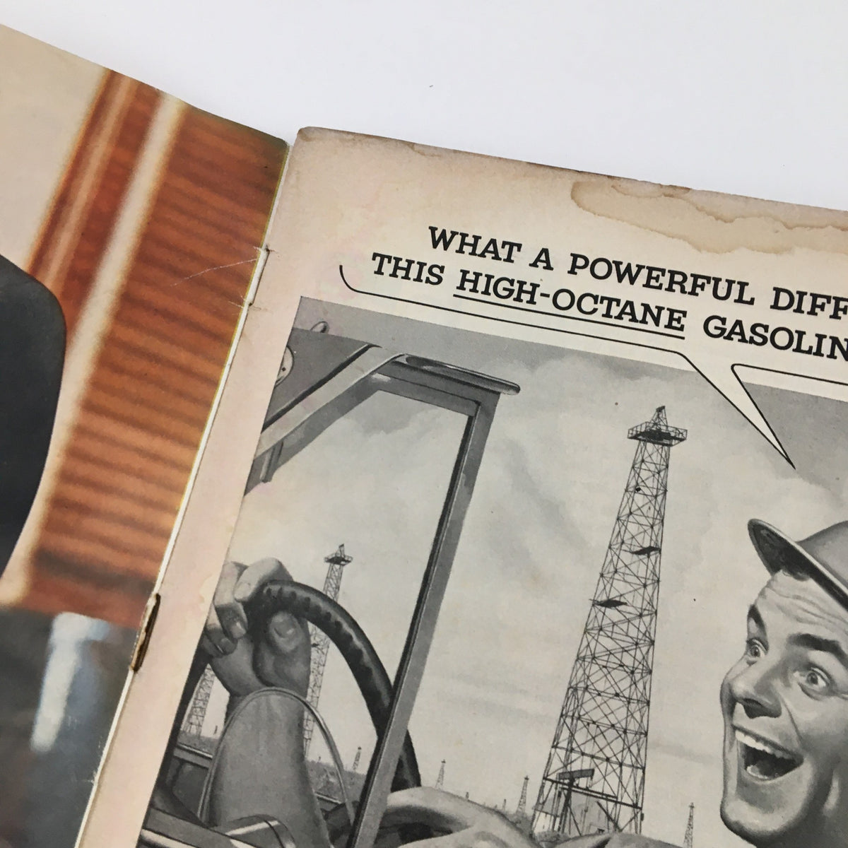 Interior page of Sports Illustrated Magazine October 11 1954 showing an advertisement for high-octane gasoline.