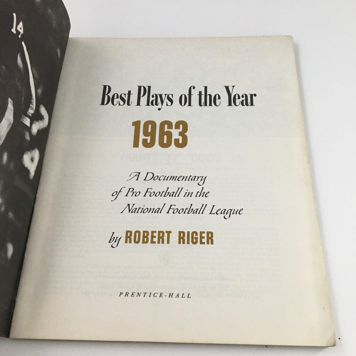 Interior page of NFL Best Plays of the Year 1963 documentary, displaying the title and author Robert Riger in a classic layout.