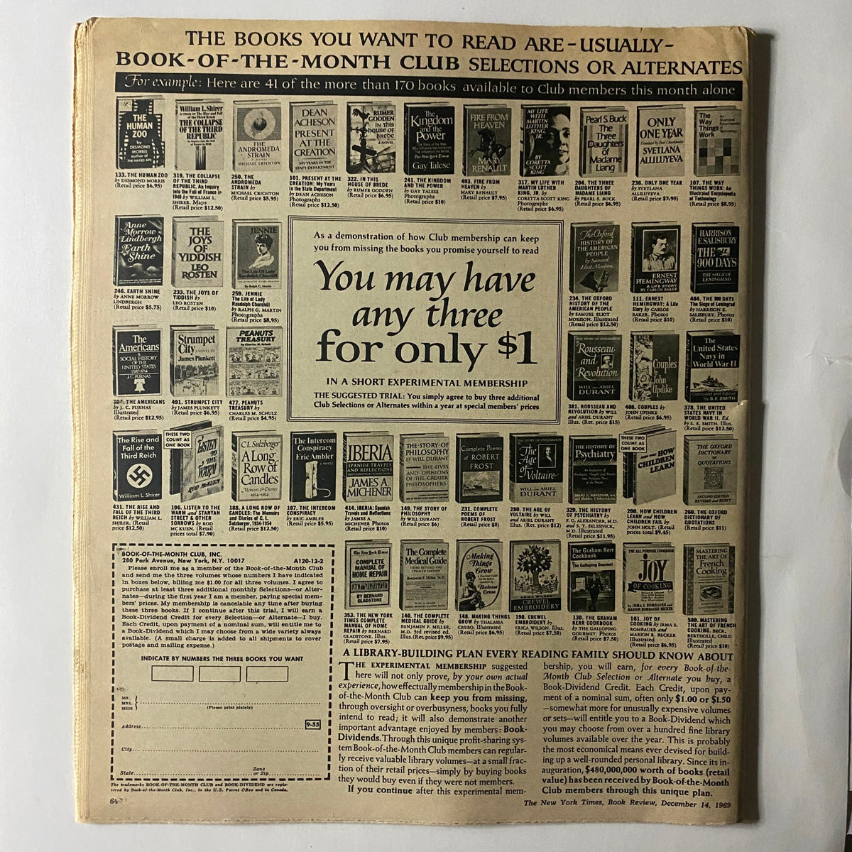 The back cover of The New York Times Book Review December 14, 1969, showcasing book advertisements and offers from the Book-of-the-Month Club, highlighting literary selections available at the time.
