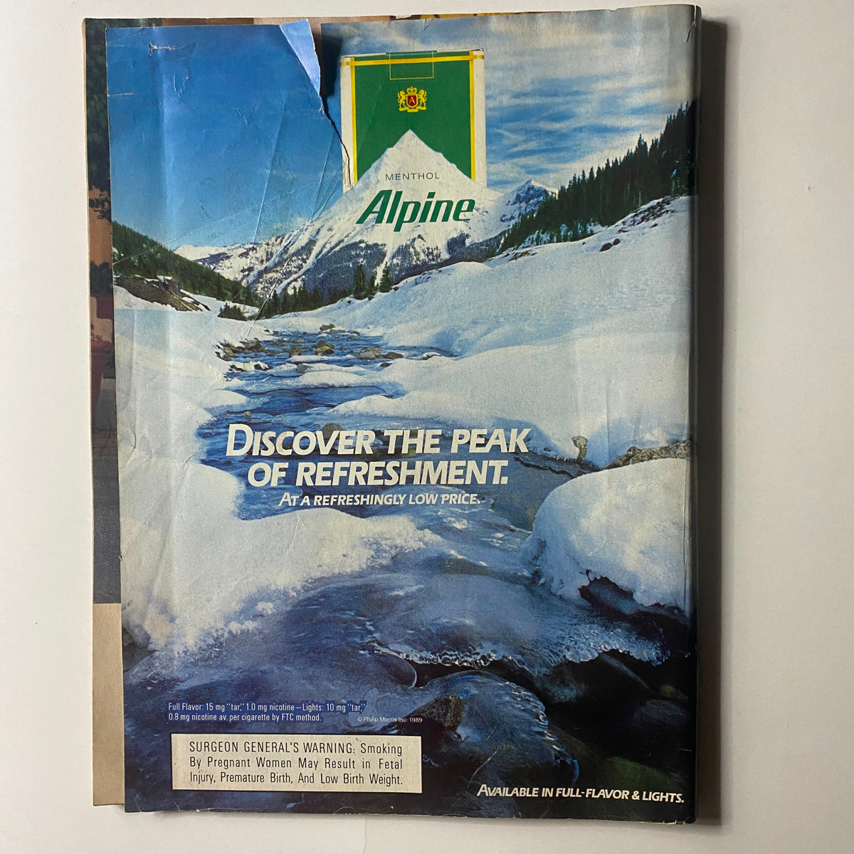 Back cover of VTG Newsweek Magazine May 22 1989 featuring an advertisement for Alpine menthol cigarettes, promoting refreshment.