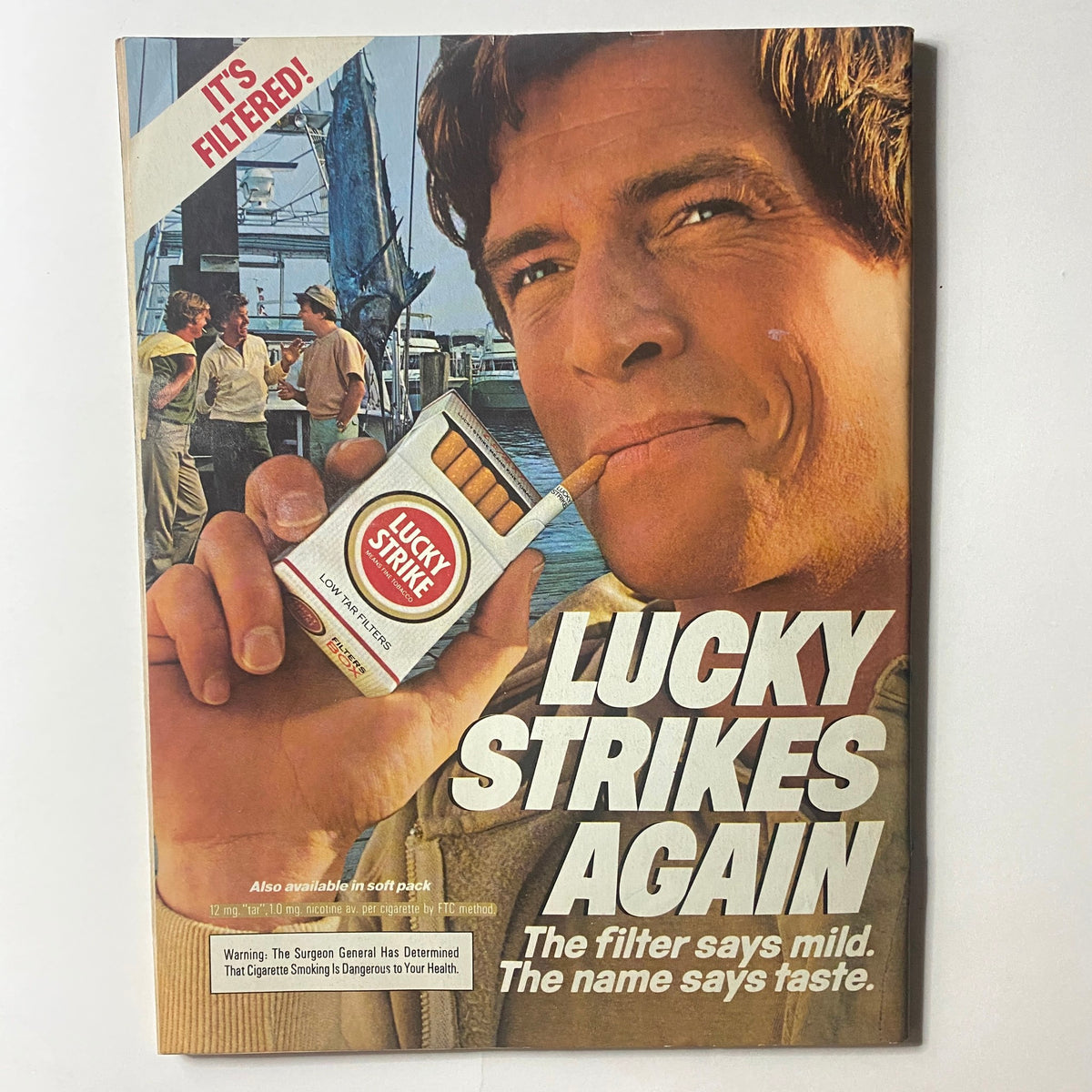 Advertisement page from VTG Newsweek Magazine December 19 1983 featuring Lucky Strike cigarettes, highlighting marketing and cultural context of the era.