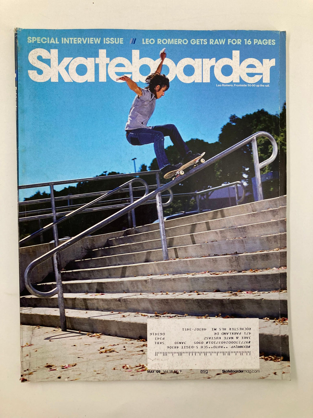 Skateboarder Magazine May 2009 featuring Leo Romero performing a frontside 50-50 grind up the rail on the cover.