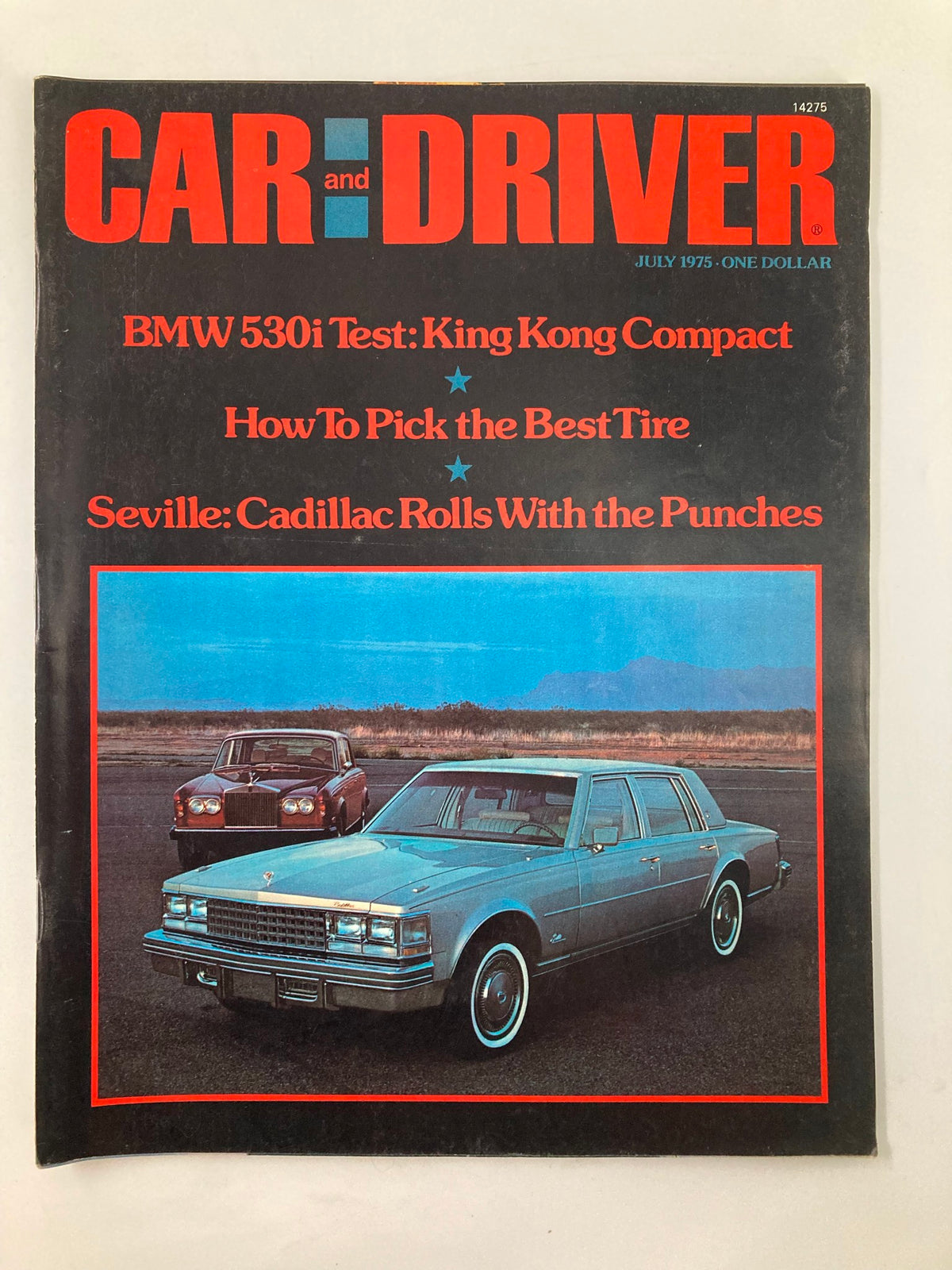 Cover of Car and Driver magazine from July 1975 featuring the title 'BMW 530i Test: King Kong Compact'. The cover showcases a light blue car in the foreground and a classic car in the background, along with headlines about tire selection and Cadillac.