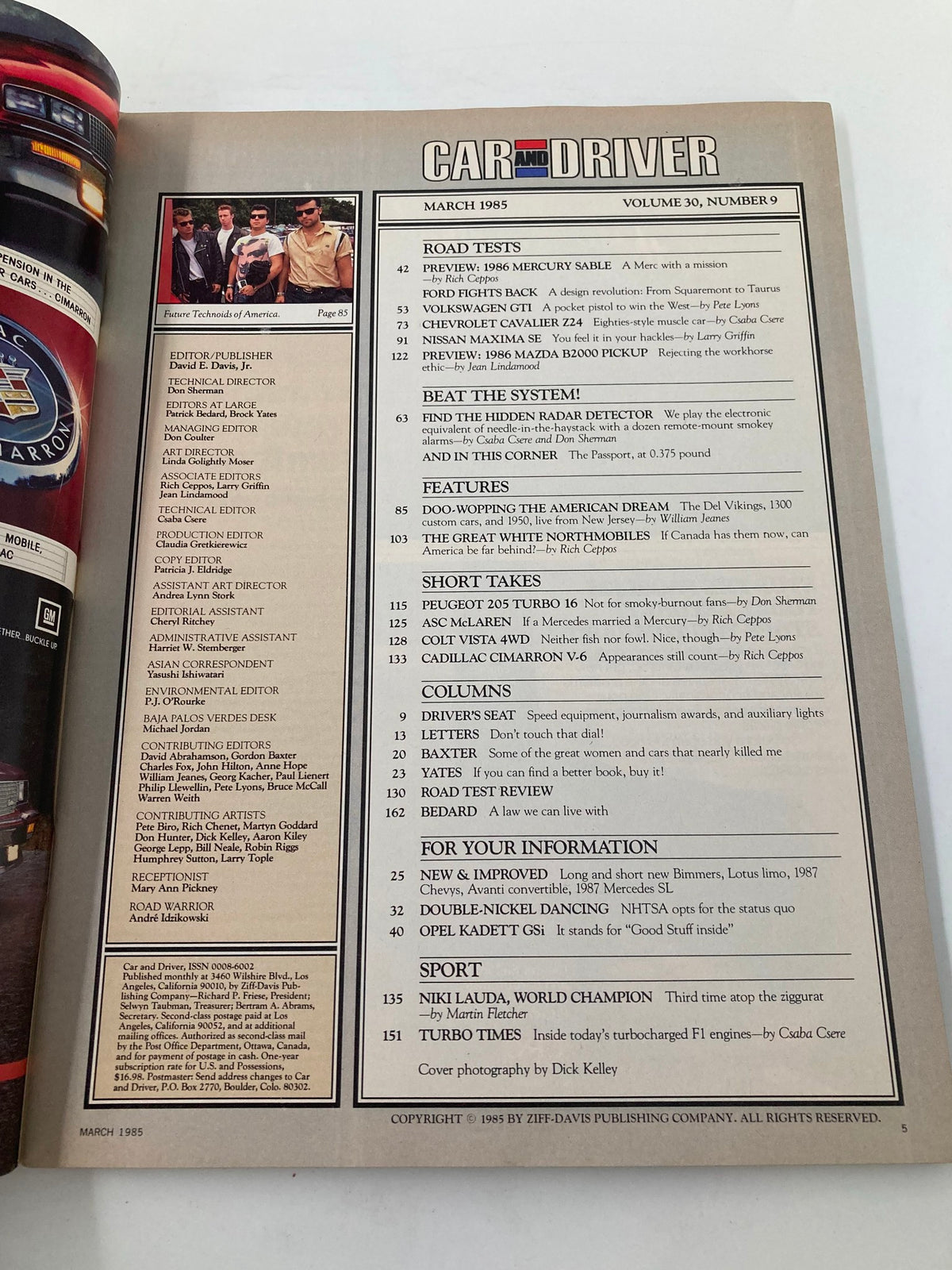 Table of contents page from the March 1985 issue of Car and Driver Magazine, featuring articles on the Ford Taurus and Mercury Sable, alongside other automotive features and reviews.